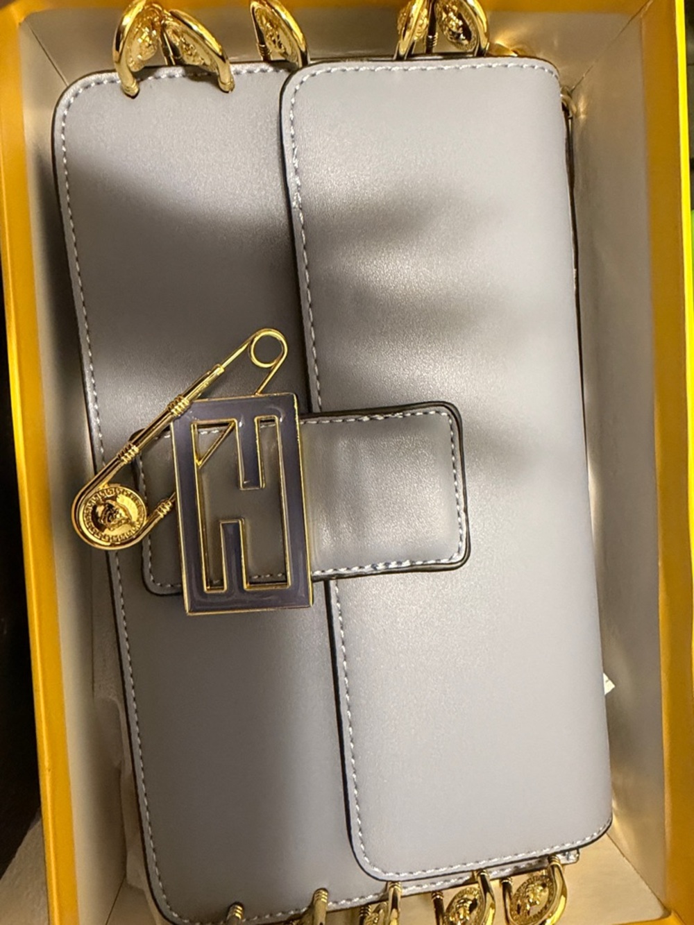 Elegant Blue Leather Shoulder Bag with Gold Hardware